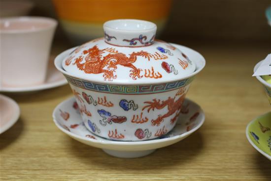 Five Chinese porcelain rice bowls, covers and stands, together with two spoons, second half 20th century, bowls 10.5cm diameter